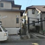 隣家のカーポートの屋根に接触していたゲッケイジュを伐採した事例│奈良県奈良市T様